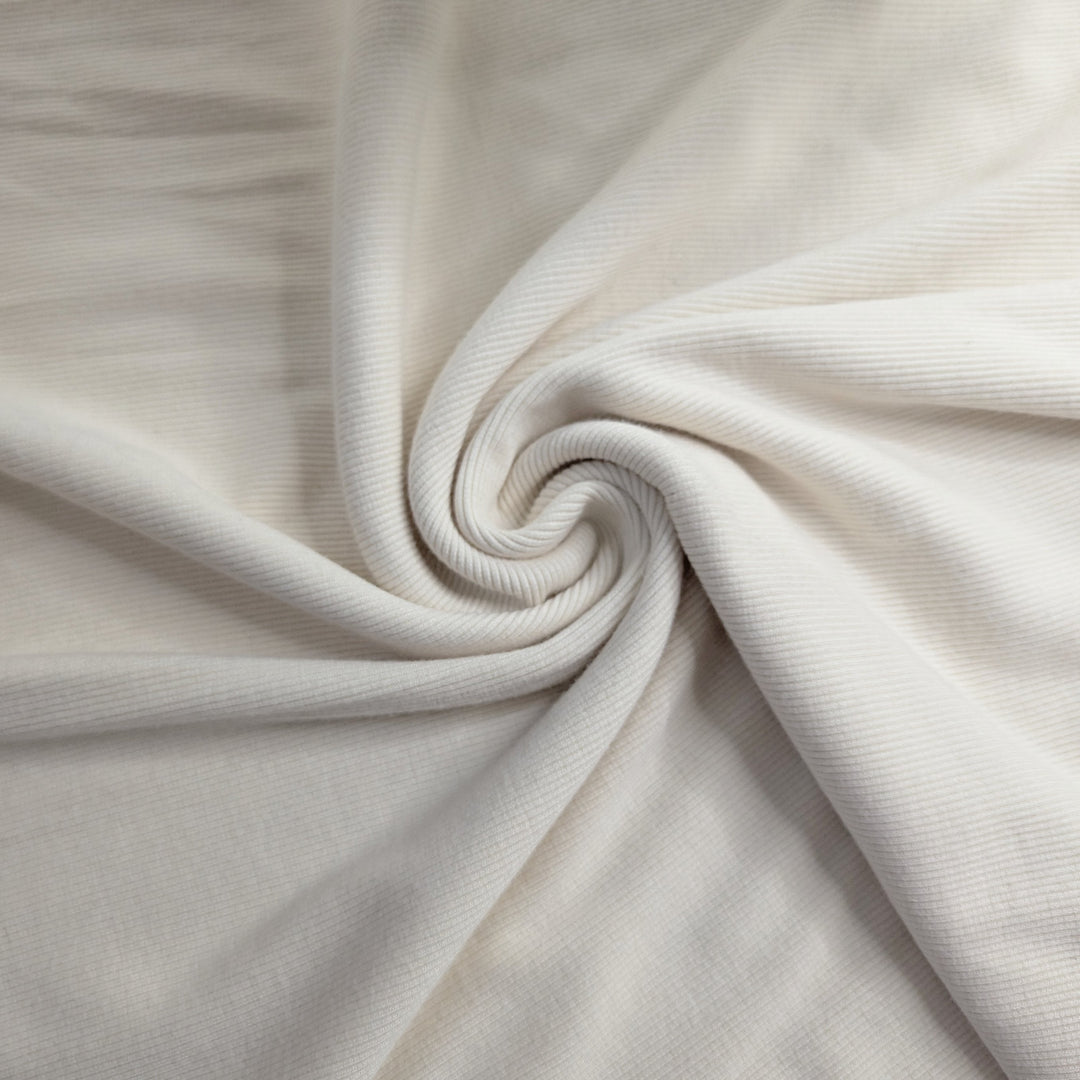 Tissu côtelé crème