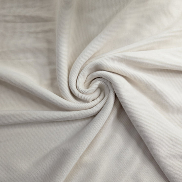 Tissu côtelé crème