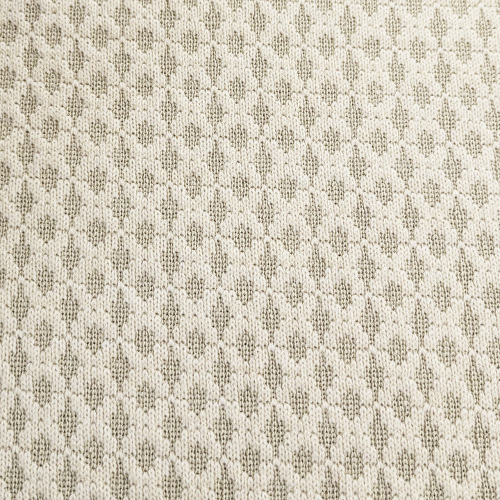 Tissu tricoté crème « Boing »