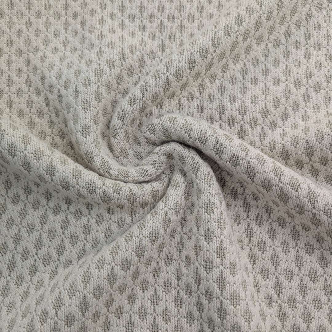 Tissu tricoté crème « Boing »