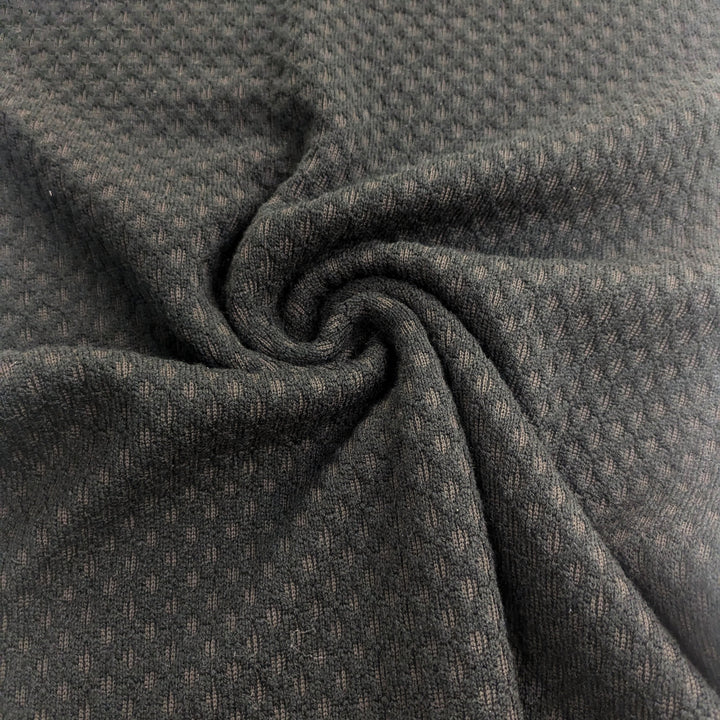Tissu tricoté noir « Boing »