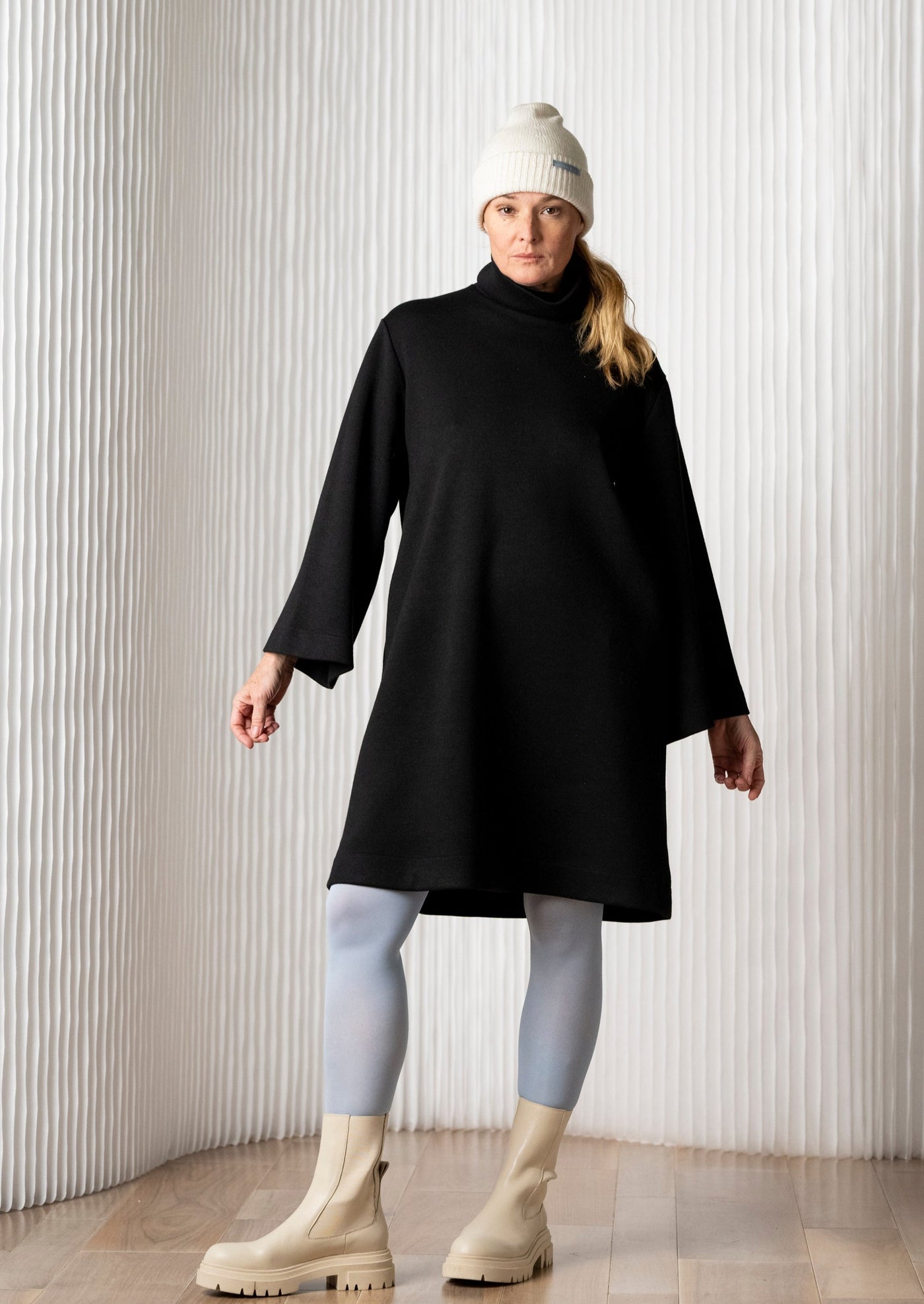oslo-linea-long-flare-sleeve-black-dress-pockets-knit